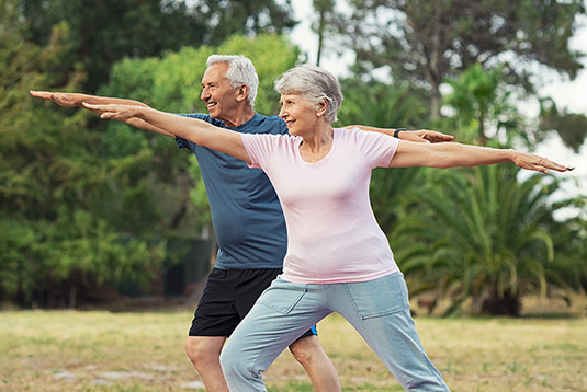 active adult approximately age 40–70 taking a relaxing outdoor